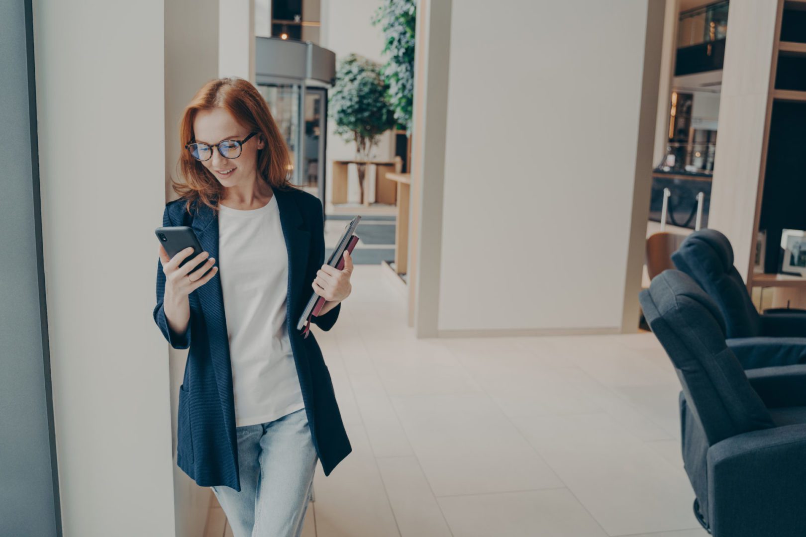 smiling redhead female business consultant dressed 2022 07 21 02 35 19 utc 1 scaled